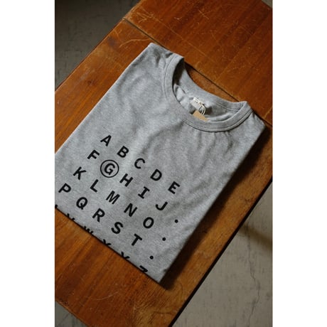 (g) グラム "TENJIKU PRINT Tee  ALPHABET"