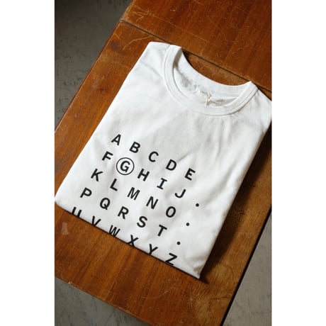 (g) グラム "TENJIKU PRINT Tee  ALPHABET"