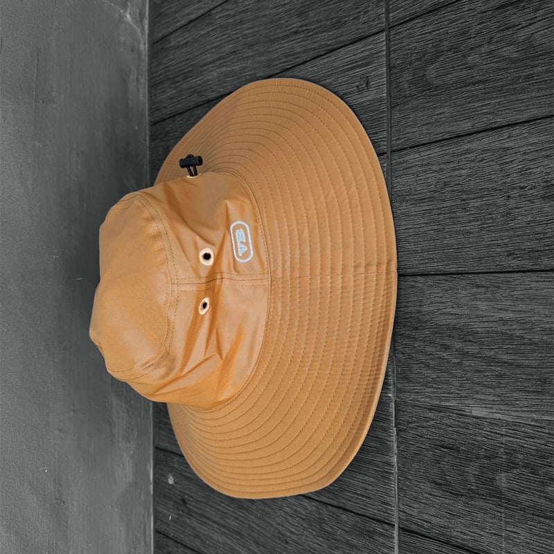 ツバ広め撥水ハット Smoky Orange | via Bella
