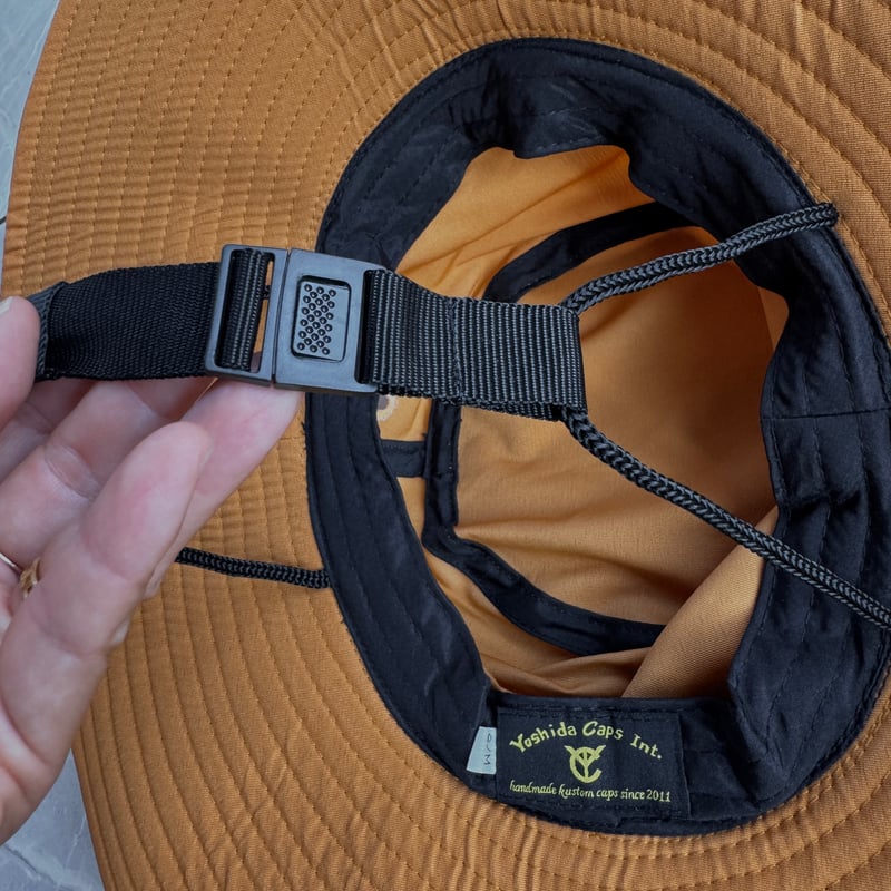 ツバ広め撥水ハット Smoky Orange | via Bella