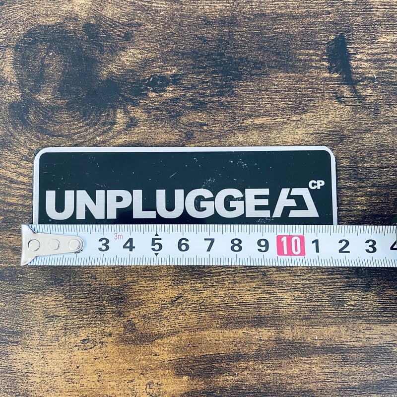 完売後 廃盤 再販なし UNPLUGGED CP アルミロゴプレート 横12cm 1枚