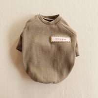 渋めのカーキブラウンのリブニット（チェックタグ）