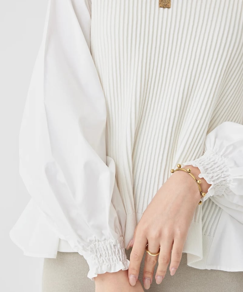torrazzo donna（トラッゾドンナ）】ニット×ラッフルパーツトップス