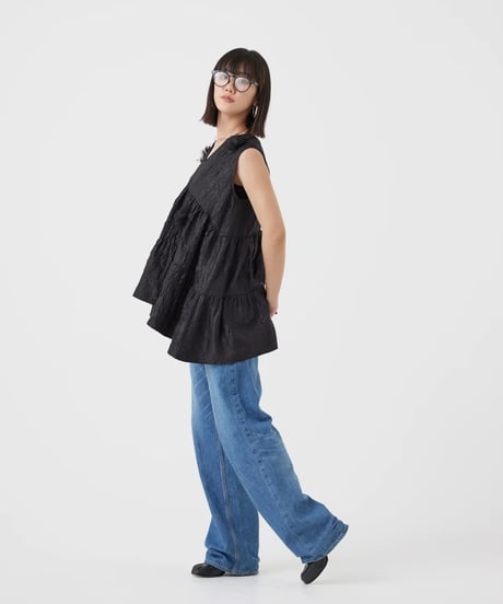 【torrazzo donna（トラッゾドンナ）】フラワーティアードトップス