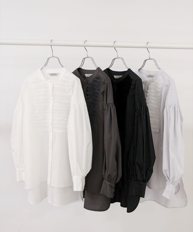 torrazzo donna（トラッゾドンナ）】チュールフリルブラウス