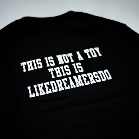 "NOT A TOY" SWEATSHIRT