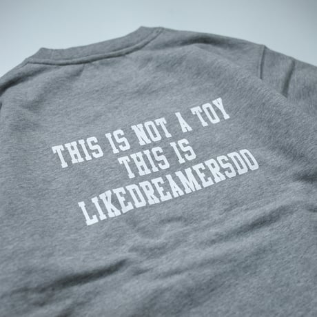 "NOT A TOY" SWEATSHIRT
