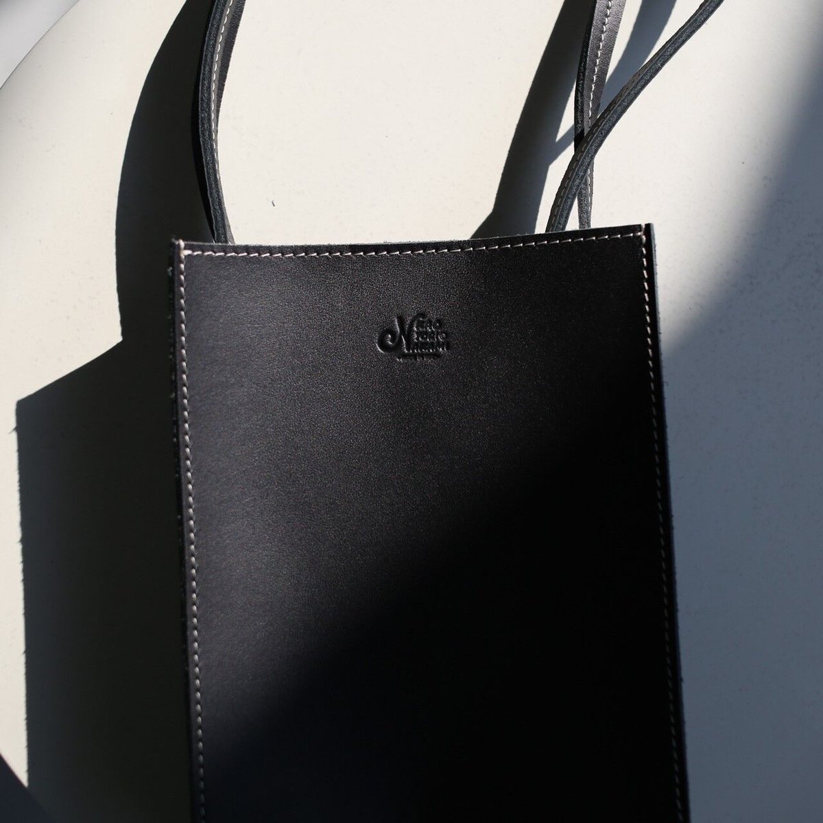 logo leather pochette | kaoyorinakami logo leather pochette | kaoyorinakami