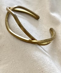 TR Waving Cross Bangle