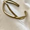 TR Waving Cross Bangle