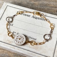 【new!!】antique round dial bracelet stainless×K18GP【K0991】