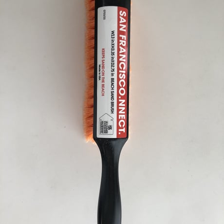 SFC BEACH SAND BRUSH.  BLK/ORG.