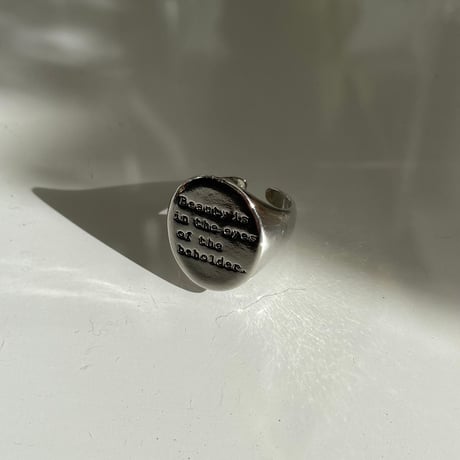 2512RG0716 / Oval lettering metal ring（Silver）