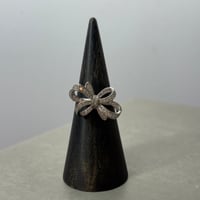 2606RG0806 / Zirconia sparkling ribbon ring（Silver）