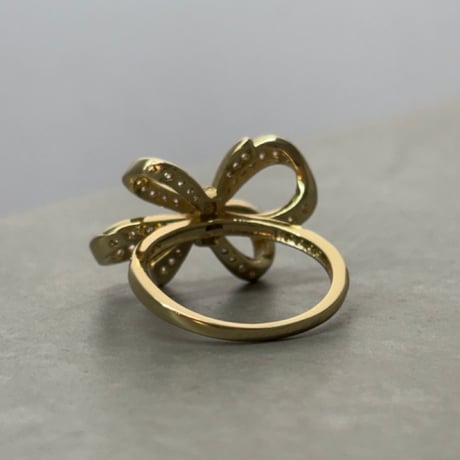 2606RG0806 / Zirconia sparkling ribbon ring（Gold）