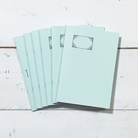 コラージュノート　ミント　本文用紙が２種類のブルーの紙・無罫　１冊 600円