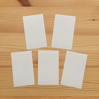 クリーム色の方眼ラベル（強粘着・名刺サイズ）5枚入り　250円
