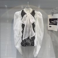 see-through lace blouse