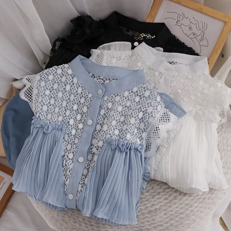 sleeveless frill tops