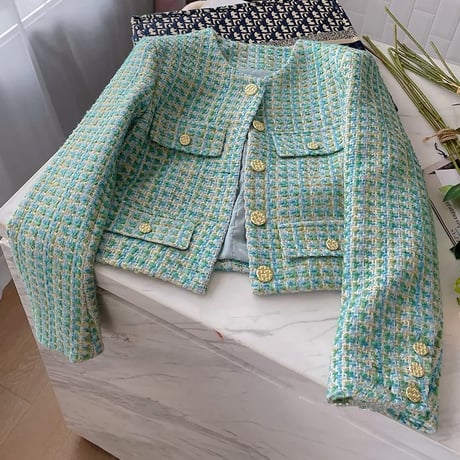 green tweed jacket