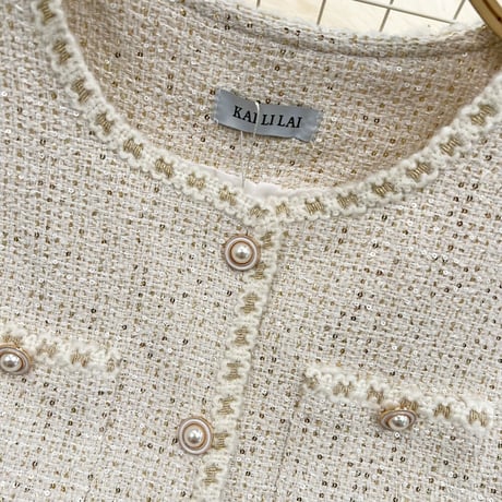 pearl button tweed vest