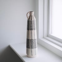 yellow and gray vase