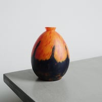 Orange and navy blue glass vase