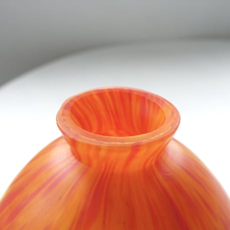 Orange and navy blue glass vase