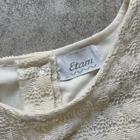 Back button design lace vest