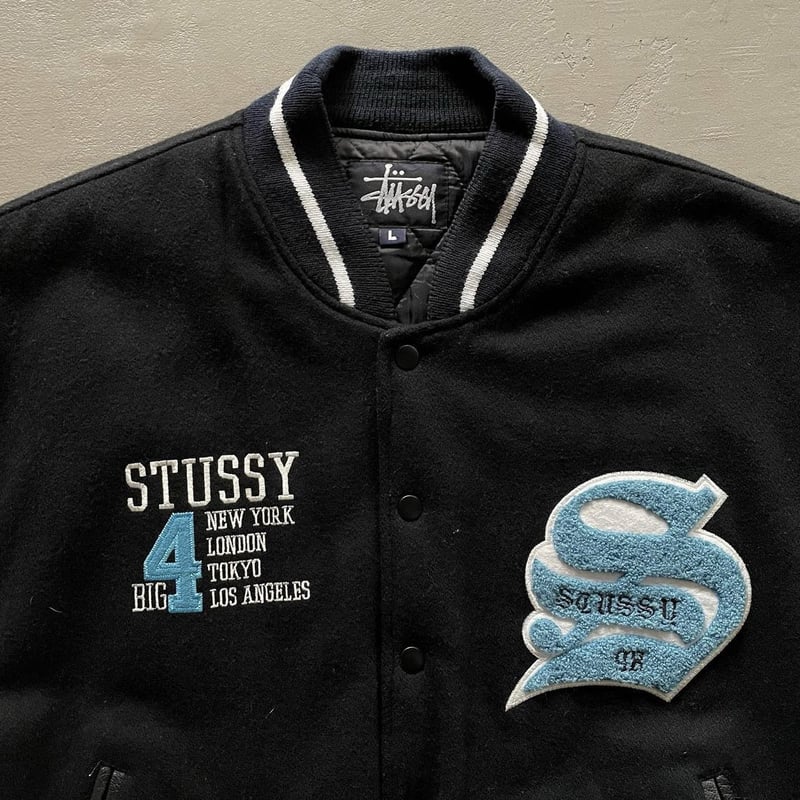 90s Stussy ”Big 4” varsity jacket | sui & shara 90s Stussy ”Big 4” varsity jacket | sui & shara