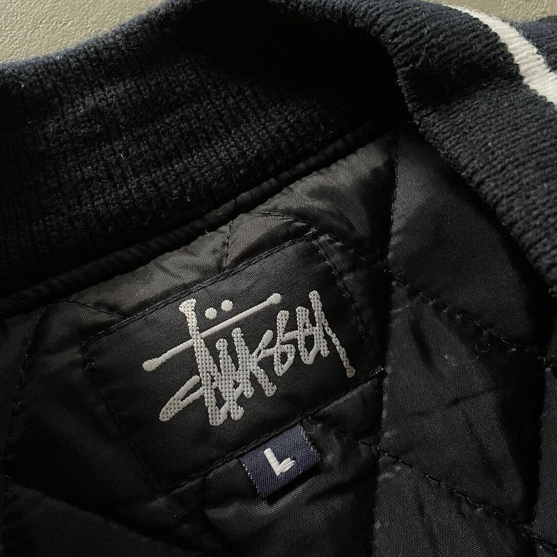 90s Stussy ”Big 4” varsity jacket | sui & shara 90s Stussy ”Big 4” varsity jacket | sui & shara