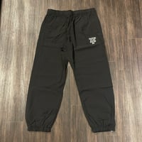 Selection of life. RUN THE BIZ LOGO Nylon Pants