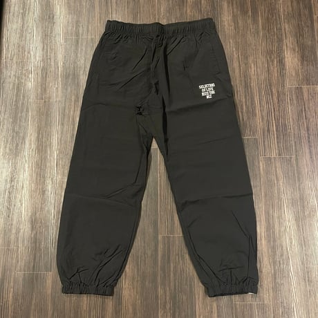 Selection of life. RUN THE BIZ LOGO Nylon Pants