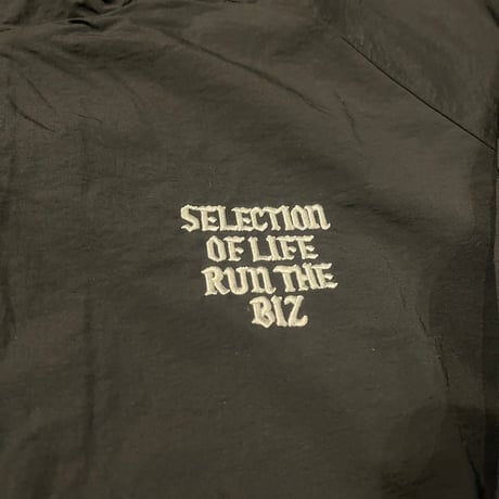 Selection of life. RUN THE BIZ LOGO Nylon Jacket