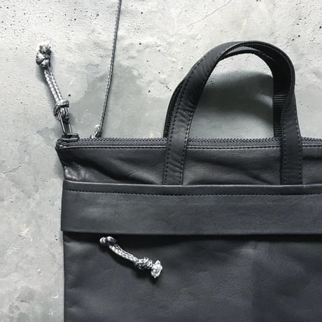 OUT LEATHER MINIMUM BAG
