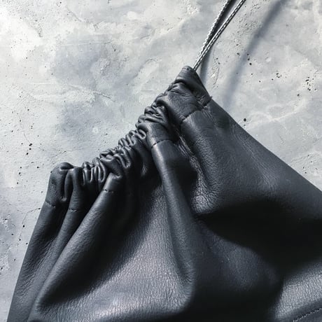 OUT LEATHER SHOULDER BAG