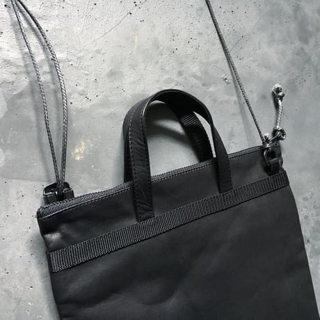 OUT LEATHER MINIMUM BAG