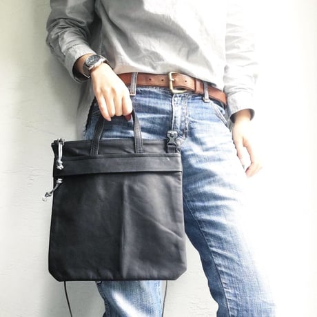OUT LEATHER MINIMUM BAG
