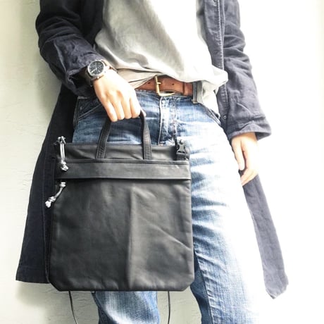 OUT LEATHER MINIMUM BAG