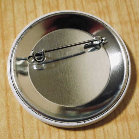 空想科学TV・缶バッヂ「Que」44mm