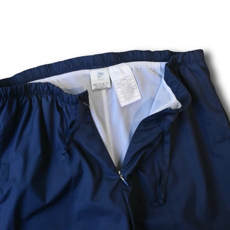 USED ”NIKE TENNIS” CENTER ZIP PANTS