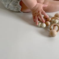 floral series wooden rattle