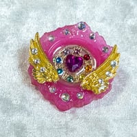 魔法少女の変身ブローチ