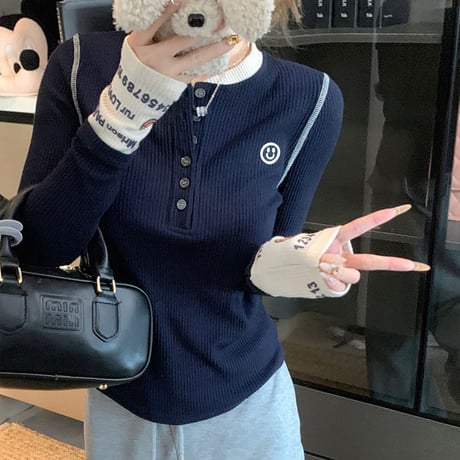 レイヤード風 ヘンリーネック リブニット トップス スマイリー ニコちゃんマーク スリムフィット 長袖 レトロ 大人可愛い ガーリー カジュアル DTCA-873412595995