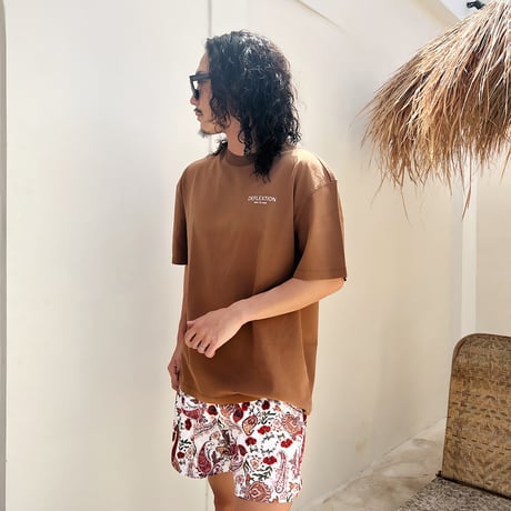 red paisley board shorts