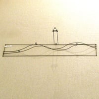 関昌生／波に灯台
