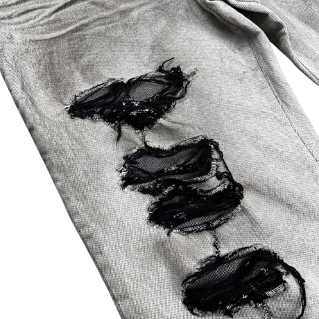 unconscious / NOIR BURN BAGGY DENIM PANTS