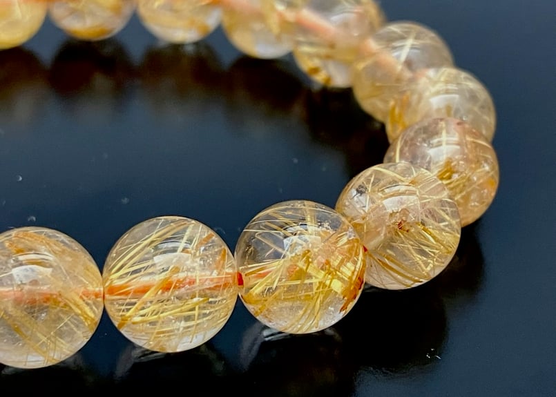 高品質】ブラジル産ゴールドルチルAAAAA 約11㎜珠 手首サイス約18