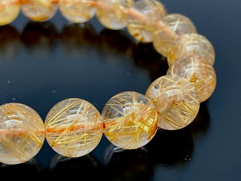 高品質】ブラジル産ゴールドルチルAAAAA 約11㎜珠 手首サイス約18