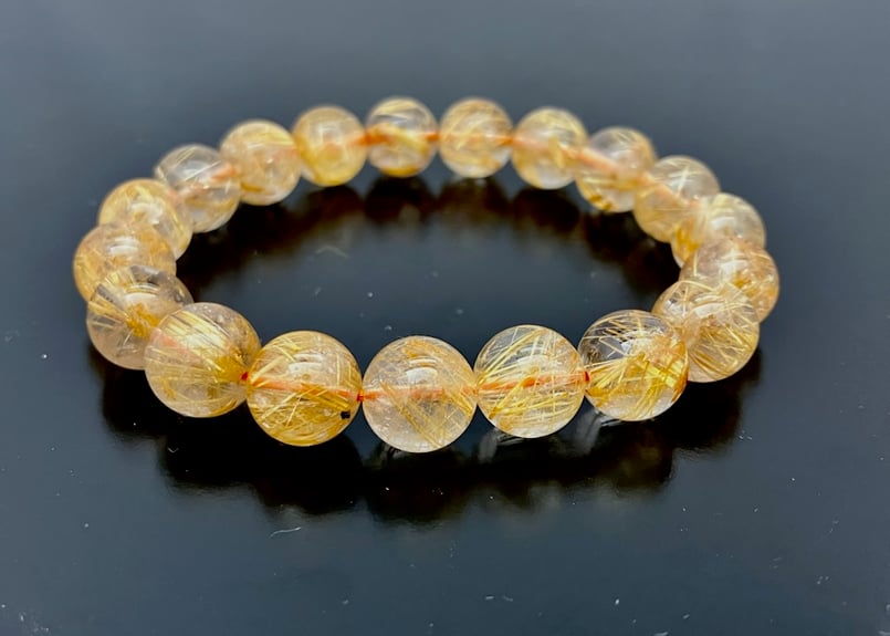 高品質】ブラジル産ゴールドルチルAAAAA 約11㎜珠 手首サイス約18